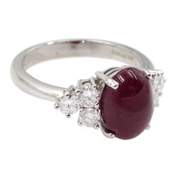 18ct white gold cabochon ruby ring, set with three round brilliant cut diamonds either side, hallmarked, ruby approx 3.20 carat, total diamond weight approx 0.55 carat