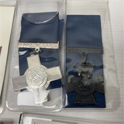 Two Imperial Service Medals to Elsie Hannah Ferguson and Fred Whitehead; each in original case; WWI Special Constabulary Medal to Inspr. Alfred W. Thompson; modern Prisoner of War Medal; cased; replica Victoria Cross and India Mutiny Medals with archive of information relating to Pte. Robert Newell V.C. 9th Lancers; replica Victoria Cross and George Cross with miniatures; and other replica medals etc