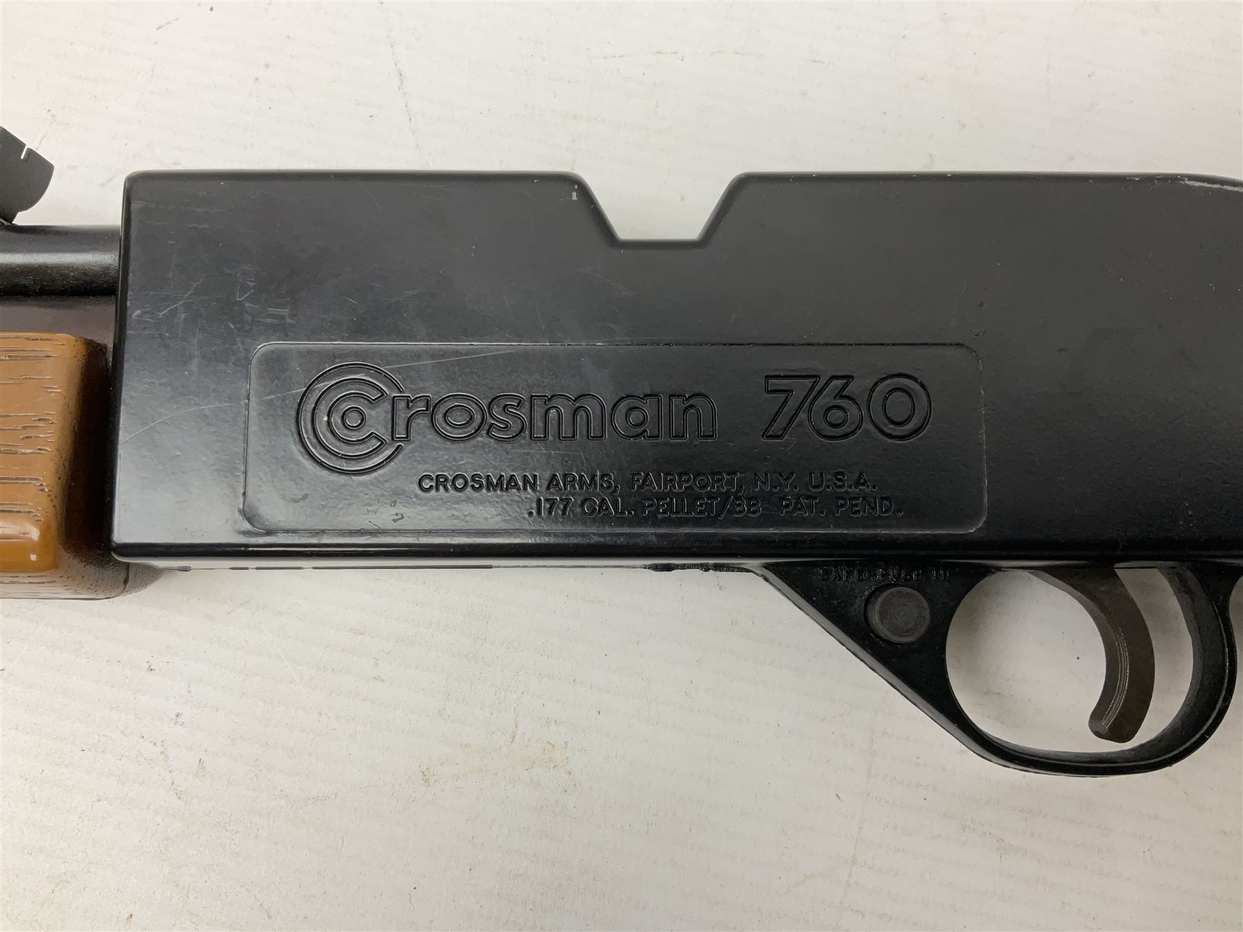 Crosman 760 .177 cal. Junior air rifle with under lever faux pump action and simulated wooden fittings; serial no.278047476, L90cm overall; and SMK B1 Synthetic .22 cal. Youth's air rifle with break-barrel action and 4 x 20 scope; serial no.1721229956084915F, L98.5cm overall (2)  NB: AGE RESTRICTIONS APPLY TO THE PURCHASE OF AIR WEAPONS.