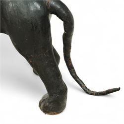 Early 20th century leather-covered decorative model of a Panther in a naturalistic stance, prowling forward with arched back, lowered head, and extended tail, open jaws revealing teeth and fangs with nylon whiskers
