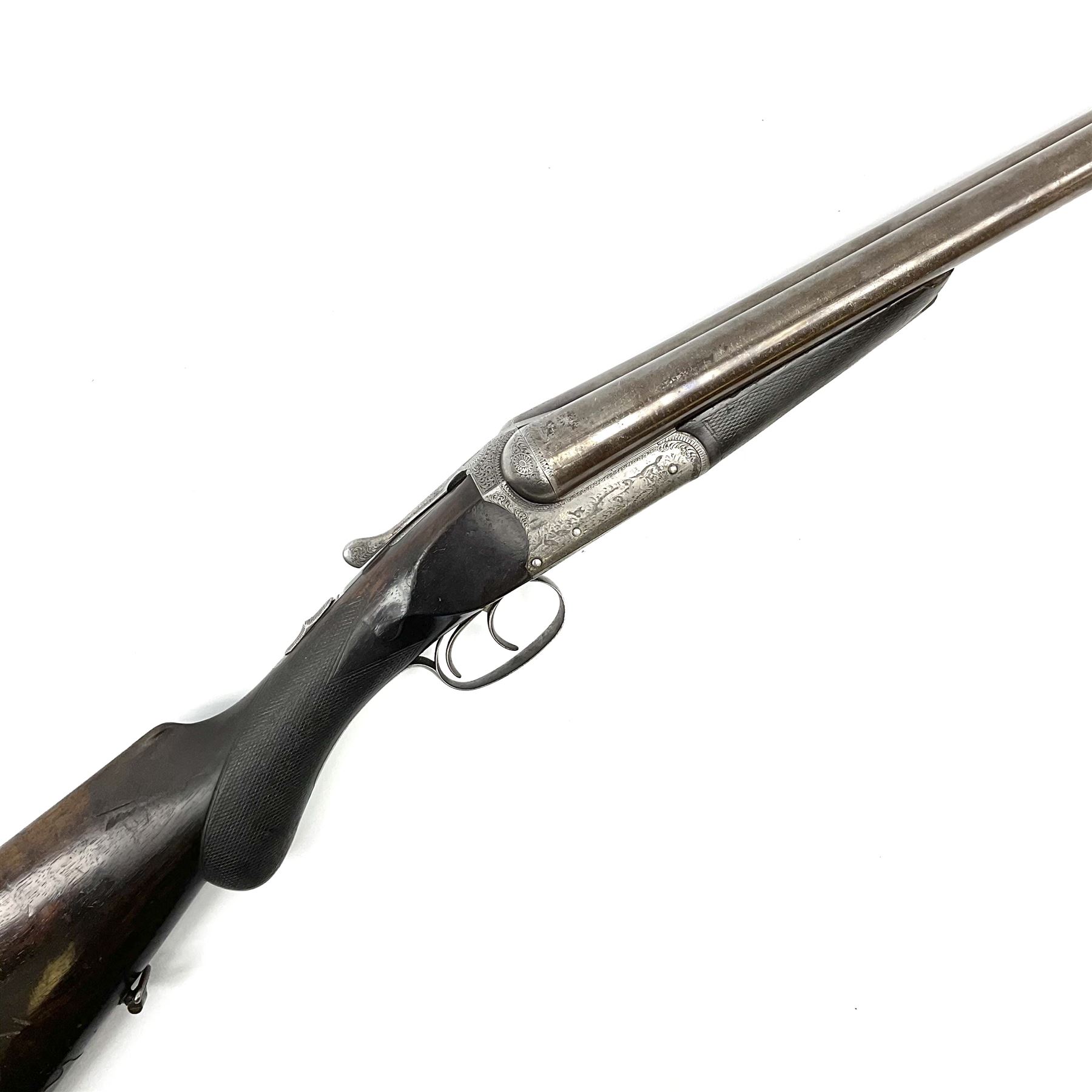 Lincoln Jeffries 12-bore side-by-side double barrel lightweight boxlock non-ejector sporting gun,  out-of-proof 66cm damascus barrels with sunken ribs, profusely engraved action, Prince of Wales walnut stock with chequered pistol grip and fore-end and thumb safety, sling swivels under barrel and stock, serial no.2139(?), L107.5cm overall RFD ONLY