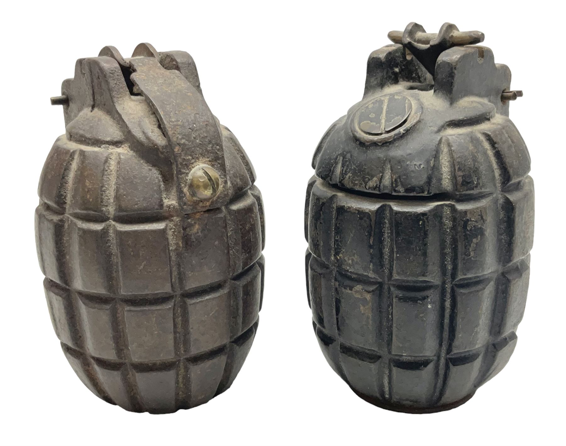 Two inert WW2 Mills Bomb (pineapple) hand grenades; one adapted as a money box with coin slit to the side and later cap H9.5cm (2)