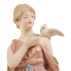 Three Royal Dux figures, Fruit Picker, no. 2082, Lady with Dove, no 2132 and Lady with Shawl no 2133, H23cm