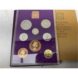 Coins and sets, including Great Britain and Northern Ireland 1970 proof coin collection in card folder, Queen Elizabeth II 2021 'Through the Looking Glass' five pounds, 2021 'Winnie the Pooh' fifty pence, Queen Victoria 1887 halfcrown, King George V 1914 halfcrown, commemorative coins, The Royal Mint Solomon Islands 2003 twenty-five dollars silver proof coin cased with certificate, 9ct gold half sovereign mount etc