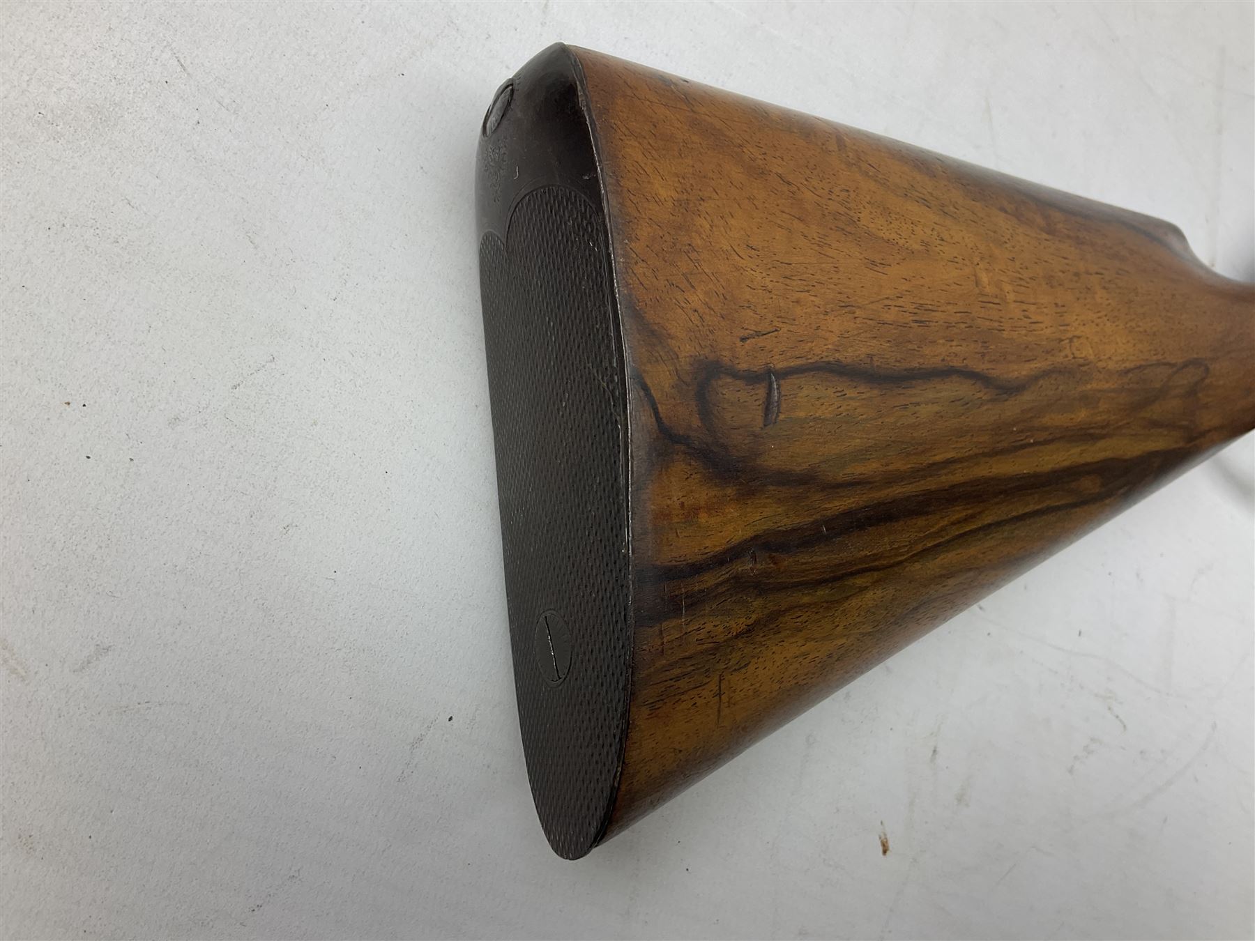 Manton .577/450 Martini Henry rifle, the 82.5cm smooth bored barrel proofed for shot, two barrel bands and bayonet fitting, engraved action with side safety, figured walnut stock with chequered steel butt plate, complete with ramrod, NVN other than 5346 on barrel, L125cm