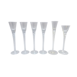  Georgian style wine glass, conical bowl on double opaque twist stem H23cm, another with double air twist stem and a set of four with conical bowls on spiral incised type stems (6)  