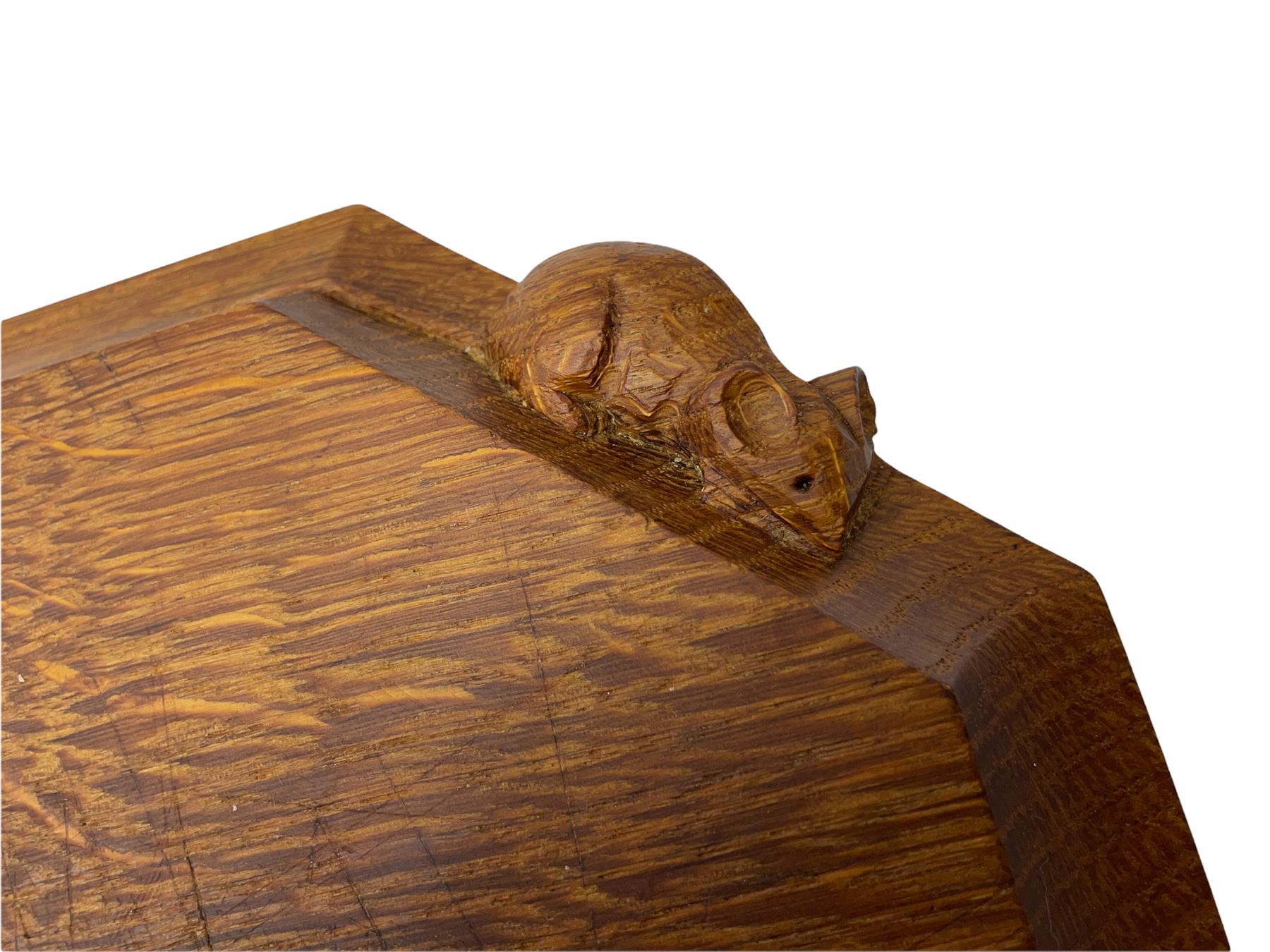 'Mouseman' oak breadboard, canted rectangular form with moulded edge carved with mouse signature, by Robert Thompson of Kilburn 
