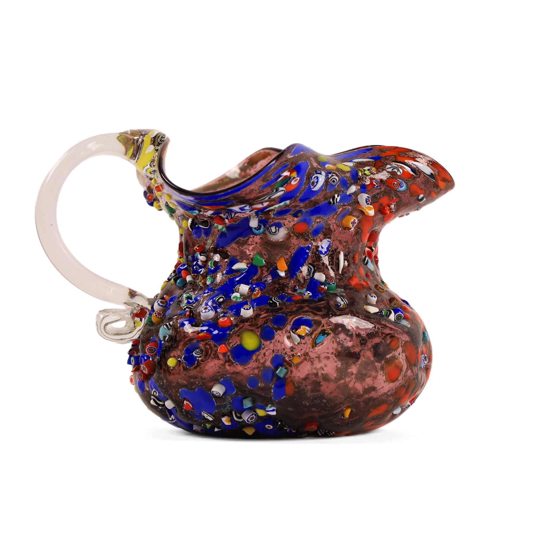 Two Murano Glass jugs by Zecchin, the fist decorated with millefiori design, upon a purple mottled ground, the other upon a green ground, H10cm