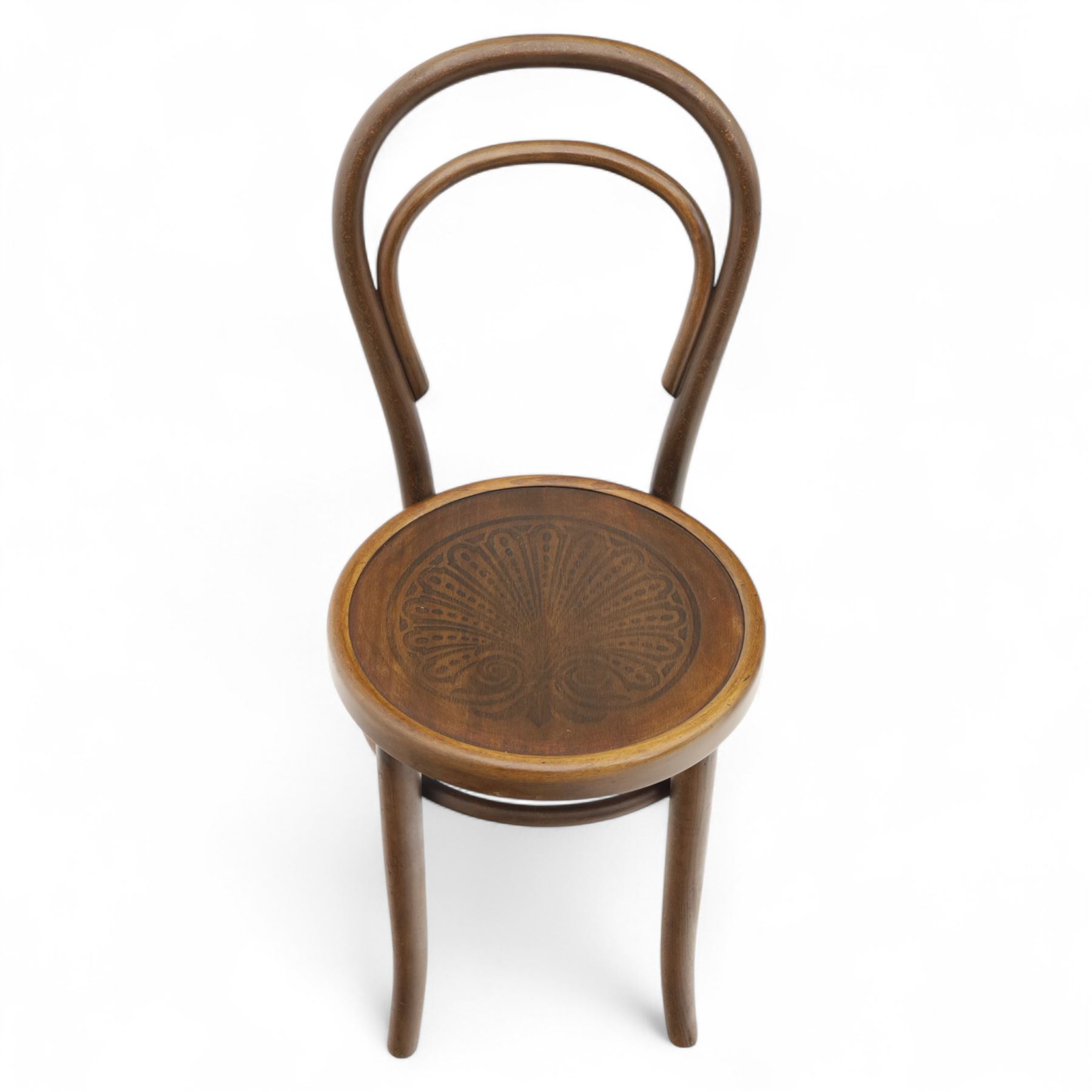 Set of three bentwood café chairs in the manner of Thonet, including a pair of side chairs (W 37cm, D 45cm, H 86cm) and a matching armchair (W 70cm, D 46cm, H 81cm), each with pressed seat decoration and continuous loop backrest