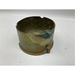 Trench Art - three WW2 brass shell case ashtrays, one mounted with Royal Artillery cap badge and button and one mounted with RA button; together with a pair of place name holders each formed from a Royal Artillery cap badge (5)