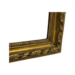 18th century design ornate gilt framed overmantle mirror, bevelled mirror plate within arched frame with pierced pediment featuring foliate and scrollwork designs