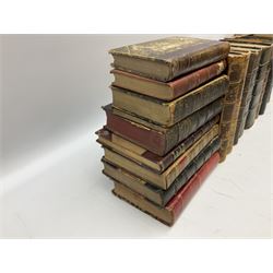 Eighteen 19th century leather bound books including Oeuvres Completes De Voltaire. 1827 Paris. Two volumes; Oeuvres De Pierre Corneille. 1892 Paris; Commentarium in Librum Geneseos Scripsit Thomas Josephus Lamy. 1883 Mechliniae; etc (18)
