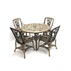 Hardened plastic garden table and four chairs, brushed gold, floral top, four supports, joining undertier, (D99cm, H71cm) matching chairs, four supports and joining undertier (W56cm)