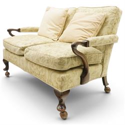 George II design mahogany framed three-piece salon suite, comprising settee and two armchairs, with pale green floral patterned upholstery, scroll carved arm terminals, loose cushioned seats and backs, raised on cabriole supports terminating in castors
Armchairs (H 80cm, W 62cm, D 73cm)