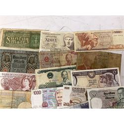 Great British and World banknotes, including Bank of England Page one pound 'EW57', Forde ten shillings 'C41N', various Belgian and Scottish notes etc