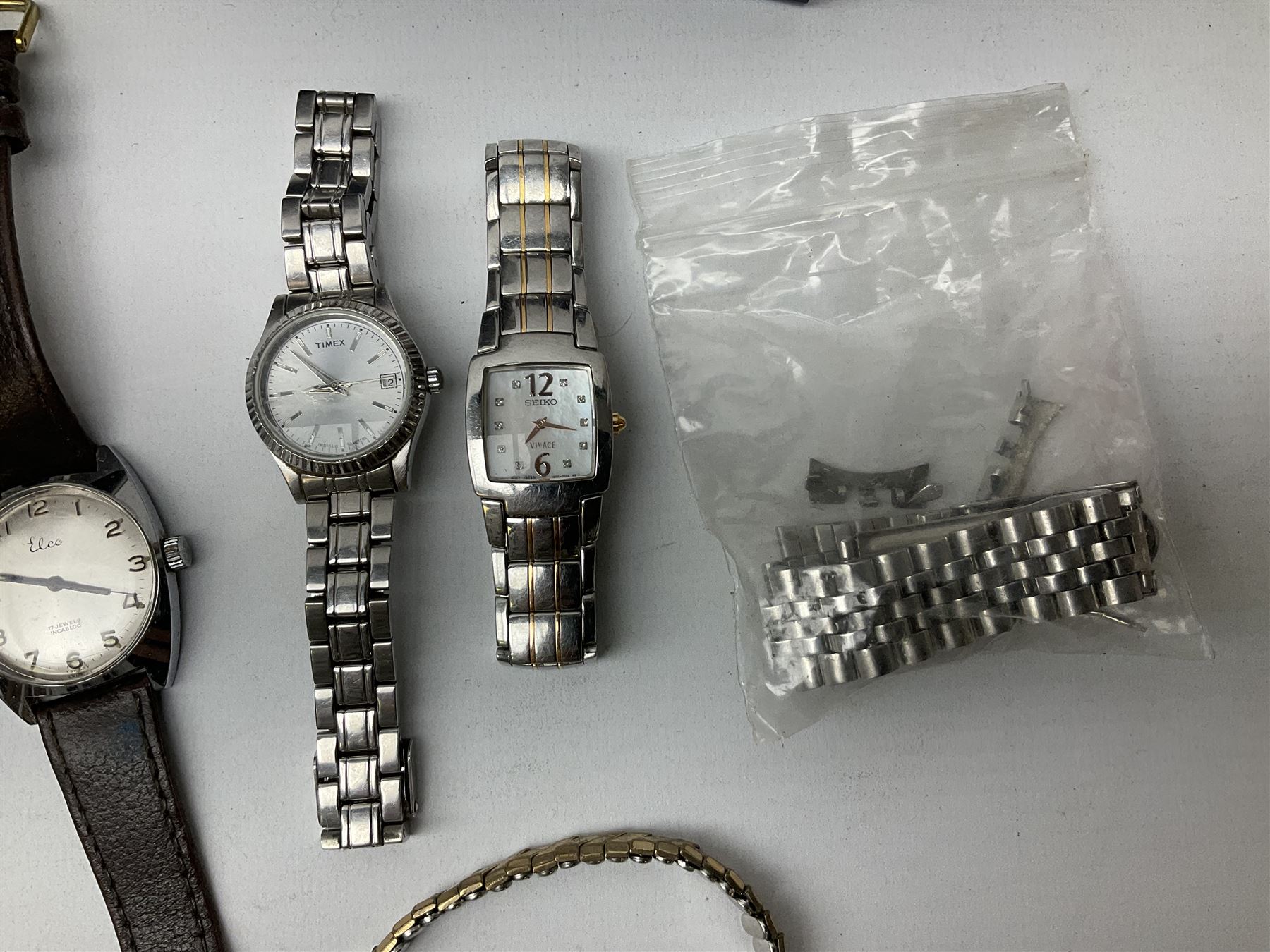 Collection of wristwatches including Accurist World Time chronograph quartz, Lorus chronograph 100m stainless steel quartz, Oskar Emil Torrini, two Citizen automatics, Seiko ladies Vivace, Titus, Limit and Tissot