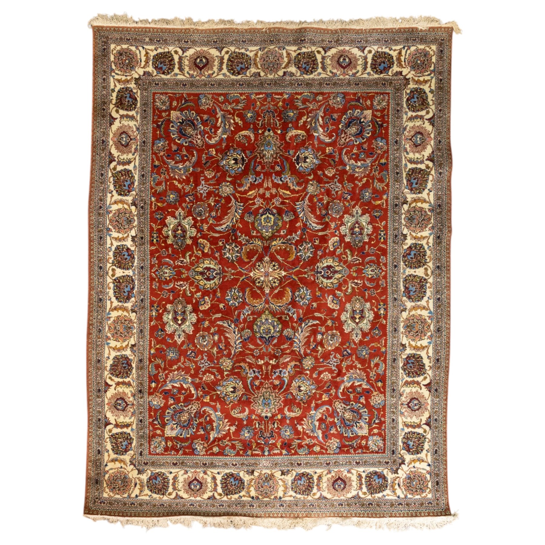 Persian Tabriz hand-knotted carpet, crimson field densely decorated with scrolling floral and foliate motifs, enclosed by a broad cream principal border with repeating floral medallions and multiple guard stripes