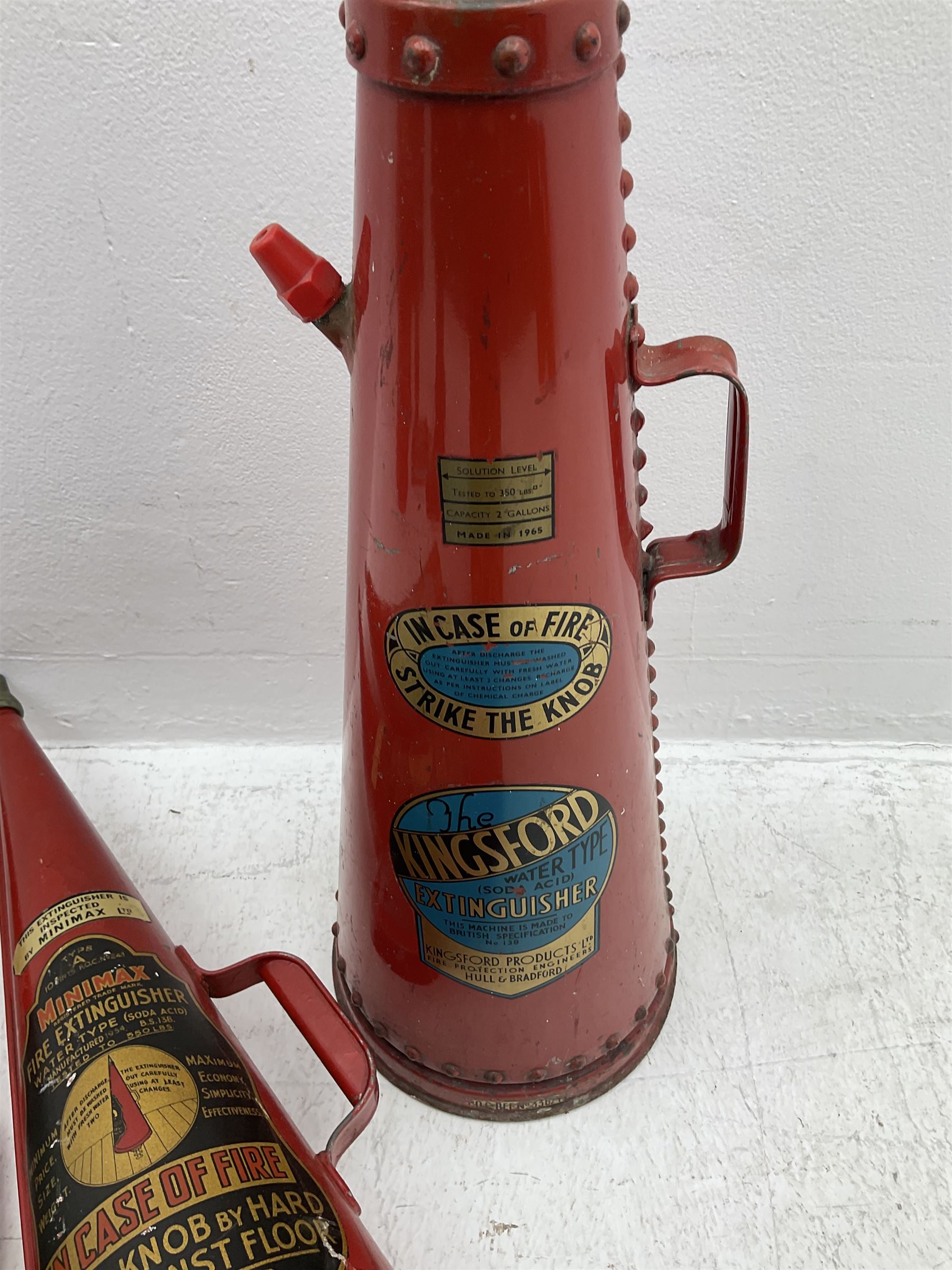 Kingsford fire extinguisher of riveted conical form, dated 1965, with painted and printed decoration, together with two Minimax conical examples dated 1966 and 1954 with gilt decoration, H approx 70cm