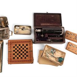 Field medical equipment, including scalpels, syringe, small weights and scales, ophthalmoscope, etc, contained within a steel uniform case