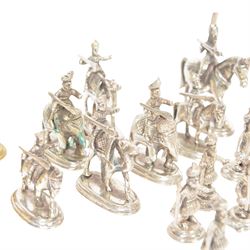 19th century Moghul Indian silver and silver gilt chess set, comprising thirty-two pieces, modelled as soldiers mounted upon elephants, camels and horses with the pawns on foot, unmarked, King H10cm