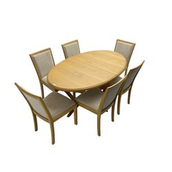Contemporary light oak oval extending dining table, shaped X-frame base (W160cm D102cm); and set of six light oak dining chairs, back and seat upholstered in textured pebble cream fabric (W50cm H90cm)