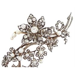 19th century gold and silver diamond and pearl en tremblant detachable brooch, the flower tremblant with a principal old cut diamond of approx 1.90 carat, the petals and stamen set with old cut and rose cut diamonds, total diamond weight approx 9.10 carat, to a foliate spray set set with further rose cut diamond and white / pink / cream pearls and ribbon tie