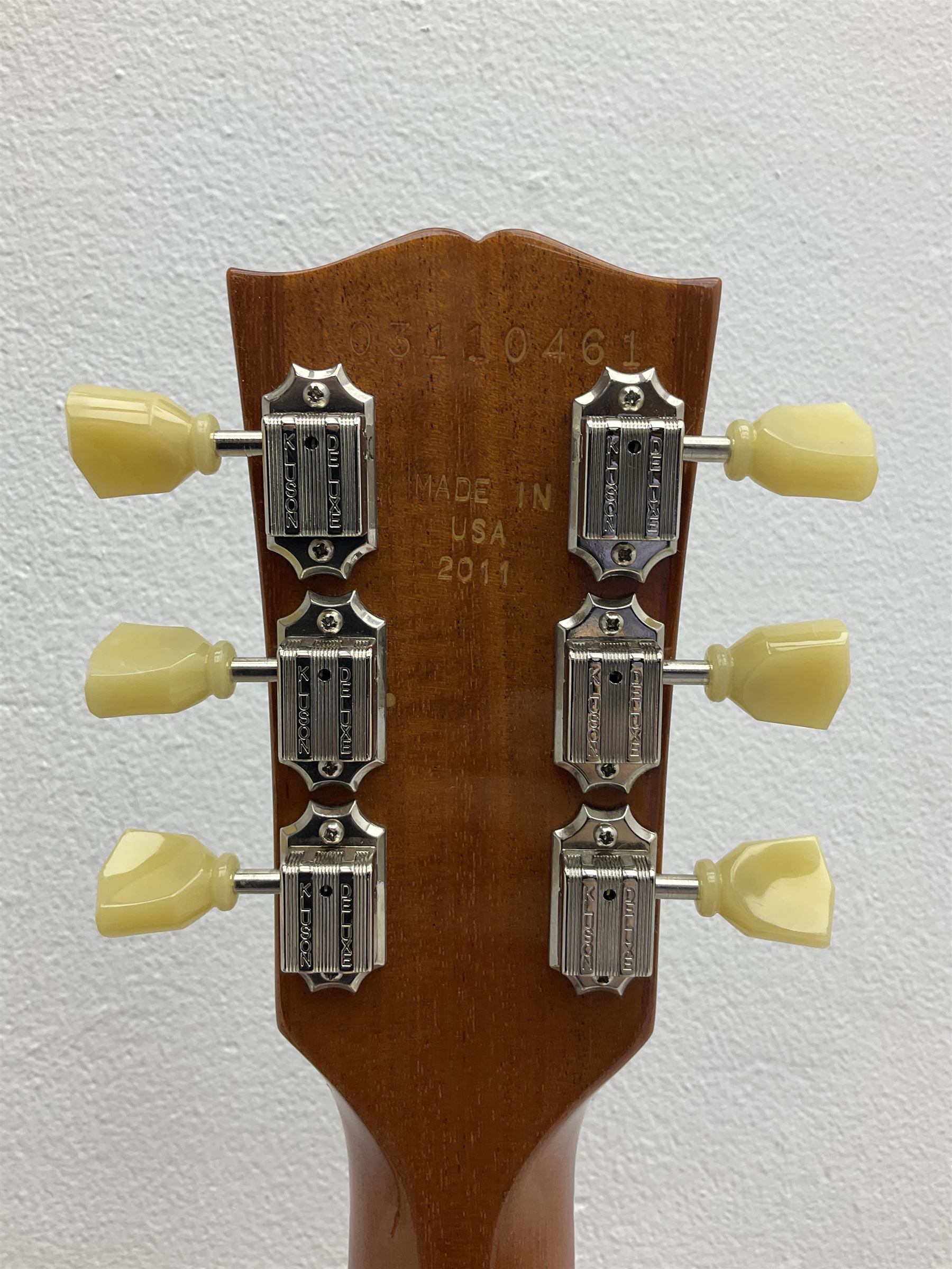 2011 Gibson Les Paul Traditional gold top electric guitar; serial number 103110461; with  mahogany back, twenty-two frets, 57 Classic humbuckers and bridge/stop bar tailpiece L100cm; in Gibson hardcase with owners manual and associated paperwork