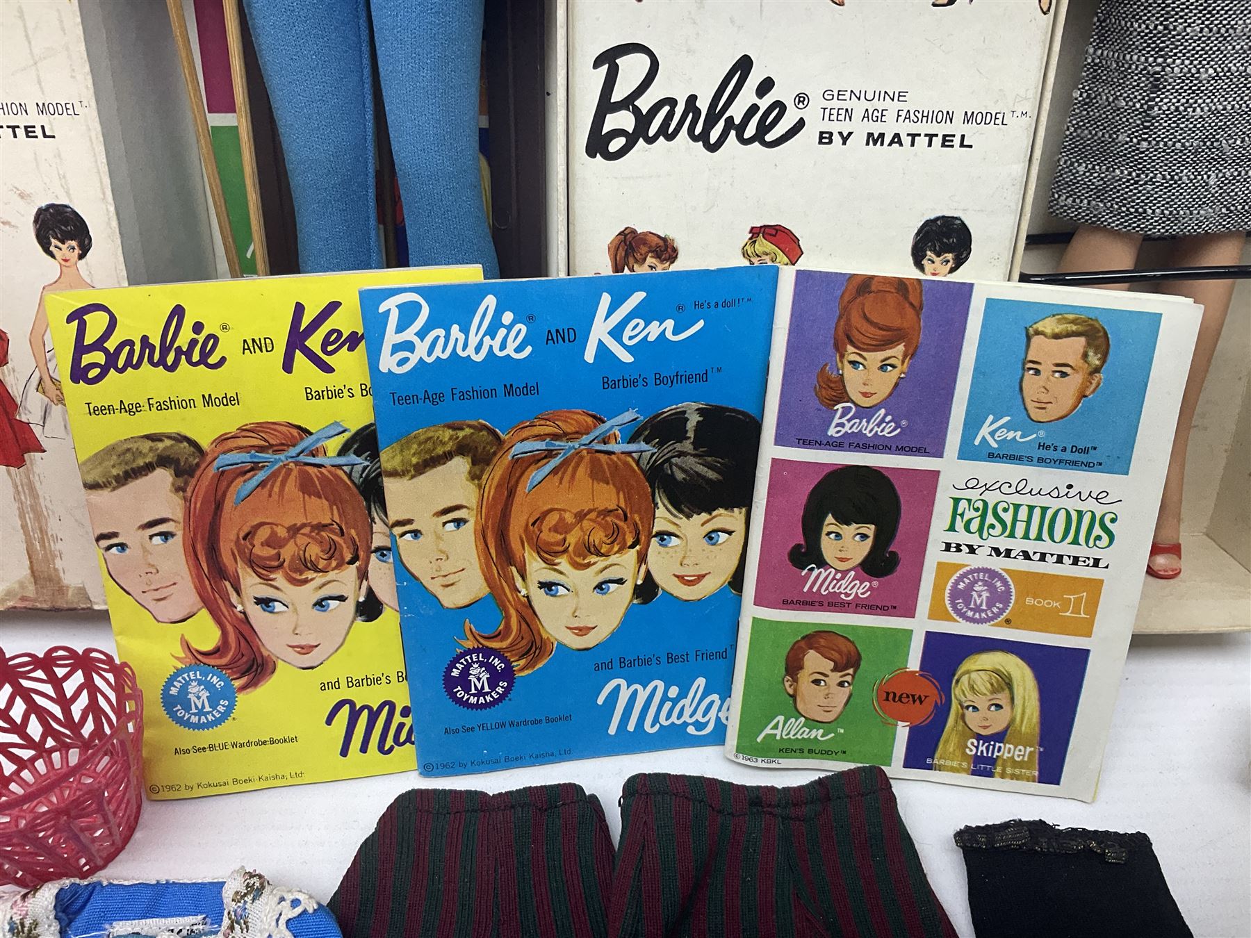 Two 1960s Mattel Barbie fashion dolls - 'Ski Queen' and 'Career Girl'; each in original decorative box with paperwork; and a quantity of Mattel and other fashion doll clothing
