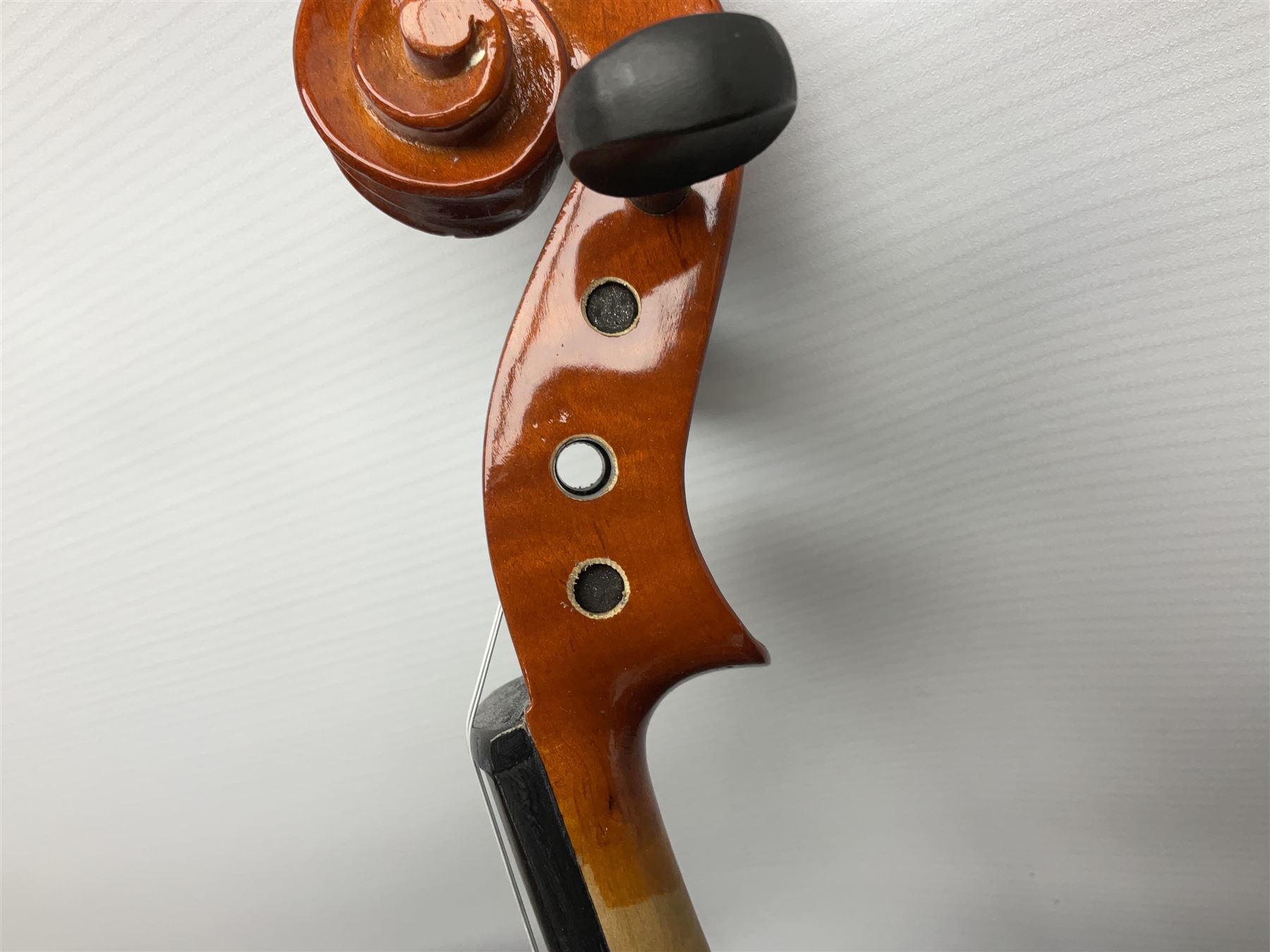 Dean small or child's size electric guitar in black, serial no.O09121956 L85cm; in gig bag; and modern student's violin with 35.5cm two-piece back in fitted carrying case with older bow (2)