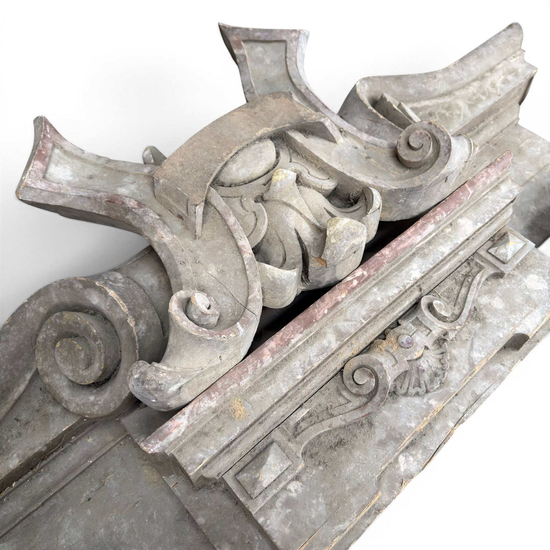 Two 19th century painted pine architectural pediments, one mostly compete with cappings