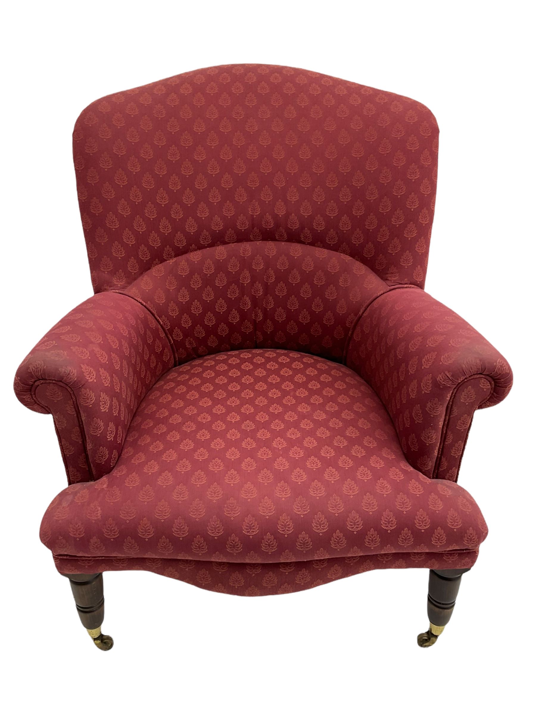 Peter Guild Victorian style upholstered armchair, tan shaped back