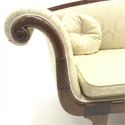  19th century mahogany framed double scroll end couch, with arched back and carved arms on lion paw curved feet, squab seat and two cushions, W220cm, D66cm, H89cm  