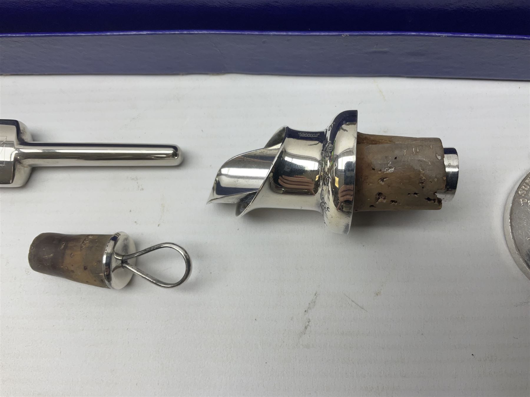 Pair of silver plated duck figures, together with other novelty silver