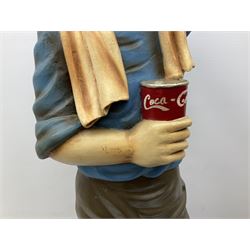 Fibreglass promotional/advertising figure of Herge's Tintin with baseball bat, standing mopping his brow and wearing plus-fours, a towel around his neck and holding a can of Coca-Cola H90cm; with similar figure of his dog Snowy seated with a baseball in his mouth (3)