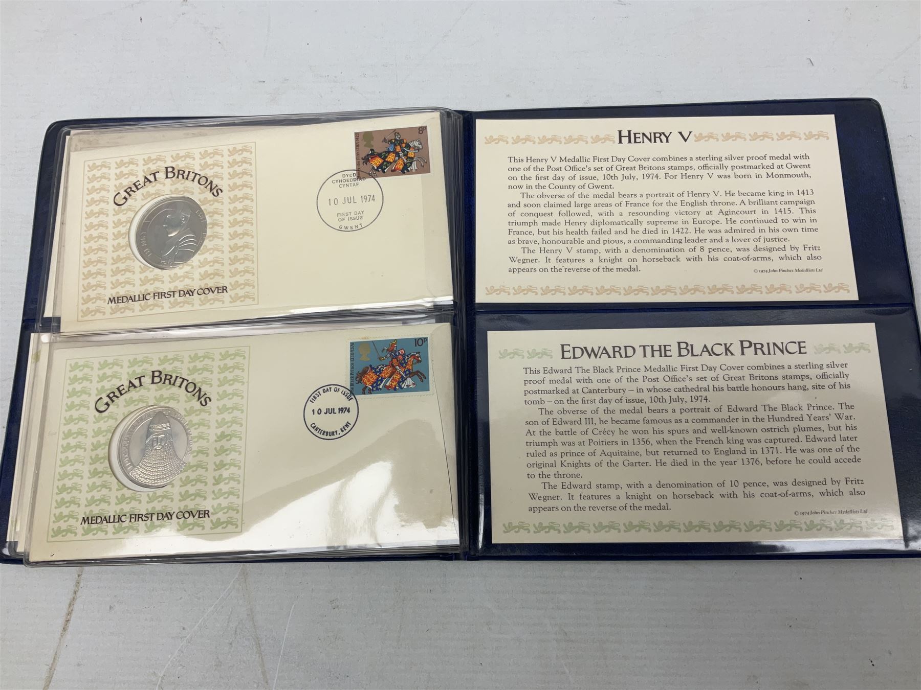 The Royal Mint United Kingdom 1984 brilliant uncirculated coin collection, 1997 and 2001 commemorative crown coins, 1997 old round one pound, all in card folders and four sterling silver medallic first day covers from the 'Great Britons' collection housed in a blue folder