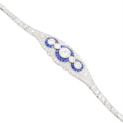 Art Deco platinum diamond and sapphire target design bracelet, five old cut diamonds, surrounded by calibre cut sapphires and old cut diamonds, all milgrain set, to a graduating old cut diamond and polished articulated rectangular link bracelet, the sides with engraved foliate decoration, French import mark, principal diamond approx 0.45 carat