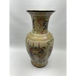 A large Japanese earthenware vase, decorated with figural panels within a scrolling and floral surround, H58.5cm.