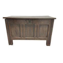 18th century oak coffer, the rectangular lid over panelled sides and front, the uprights reeded and moulded, raised on moulded stile supports