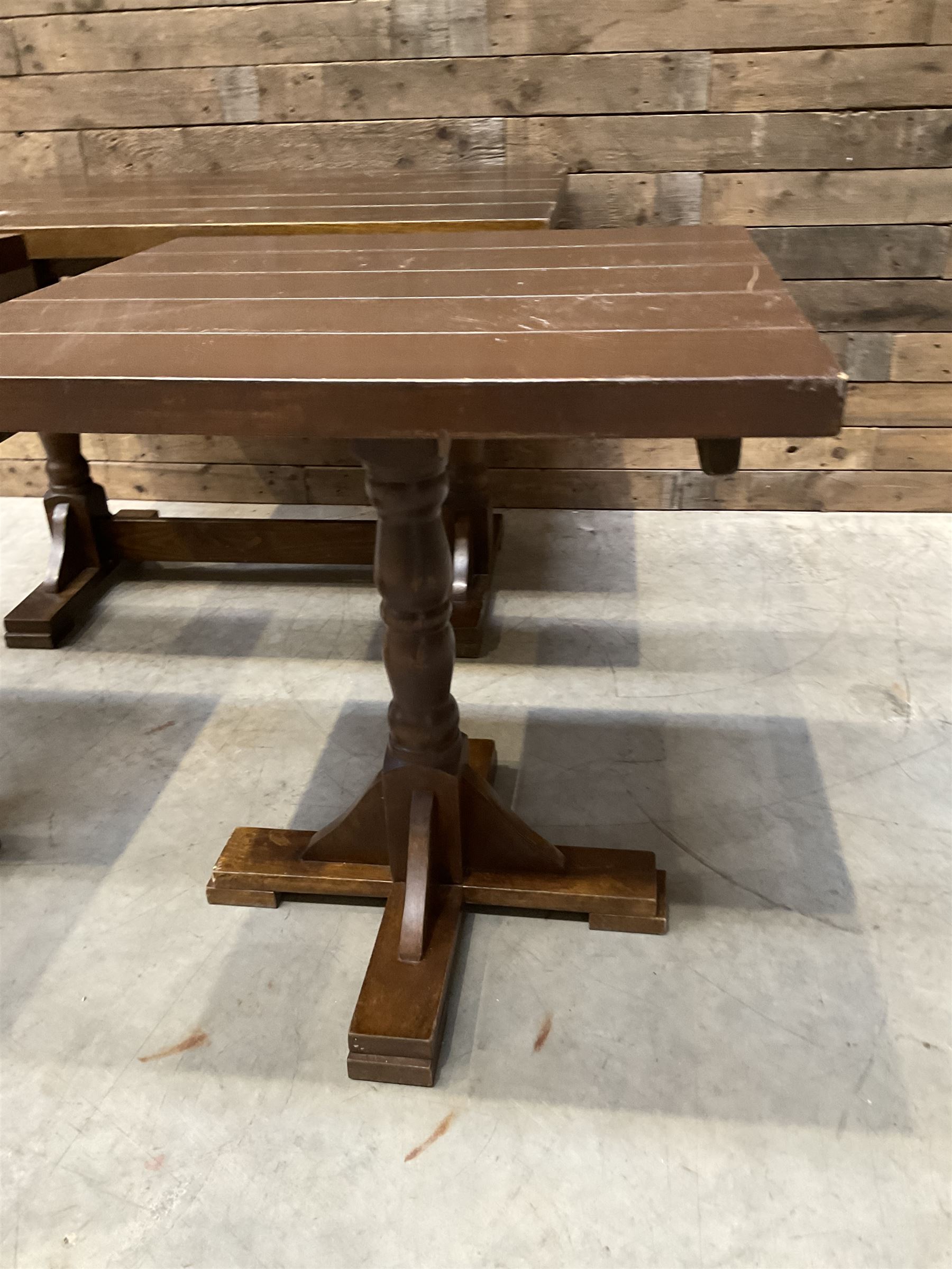 Single oak rectangular table on turned supports joined by a single stretcher (W110cm, D80cm, H75cm) and two similar square pedestal tables (W70cm, D70cm, H76cm) (3)