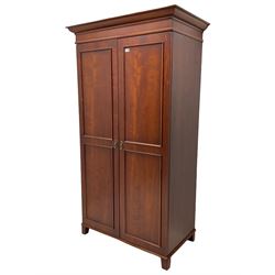 Cherrywood double wardrobe, the interior fitted with hanging rail and shelf