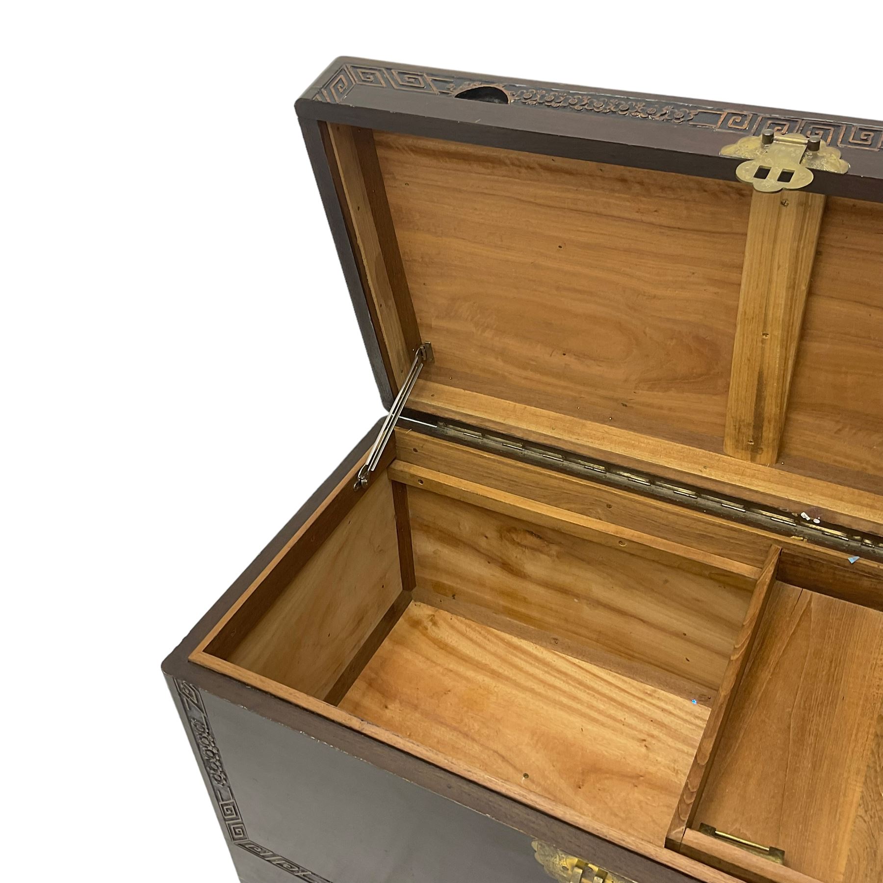 Mid-20th century Singapore hardwood and camphor wood lined blanket chest, carved with flowerheads and trailing geometric design 