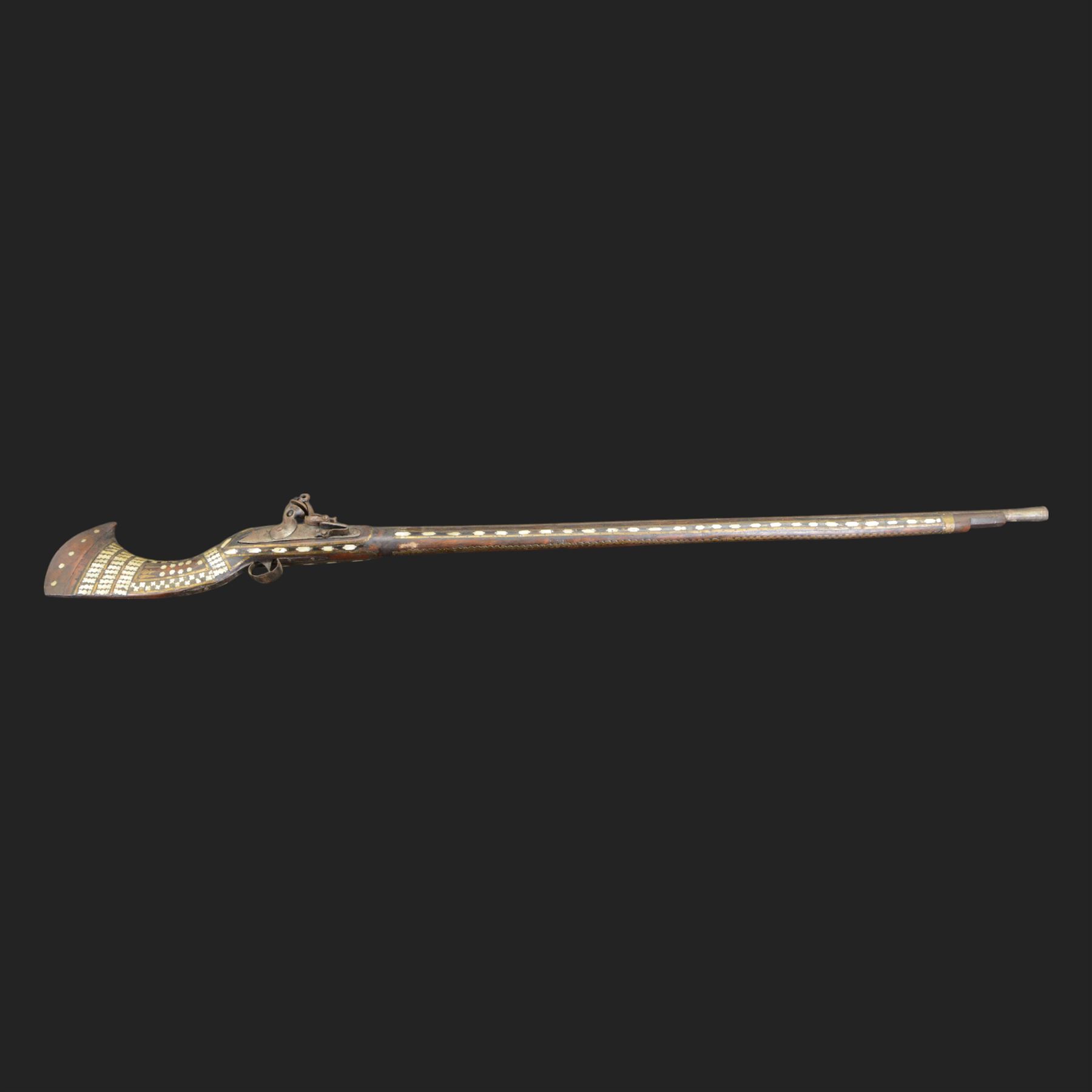 Indian Jezail style flintlock musket, with 118cm barrel, the East India Company lock marked 1818,  the curved butt inlaid with mother of pearl and brass decoration, overall L155cm