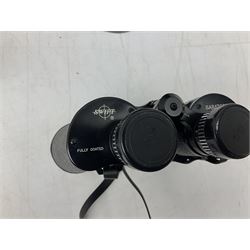 Cast metal nutcracker, in the form of a dog together with a pair of Swift Saratoga 8x40 binoculars in leather case and a hip flask, the glass flask covered in leather to the top with a detachable silver plated cup to base