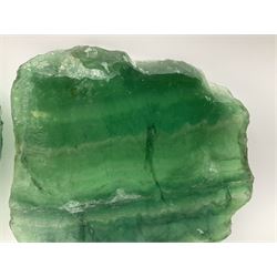 Pair of green fluorite slices, polished with rough edges, H16cm, L17cm  