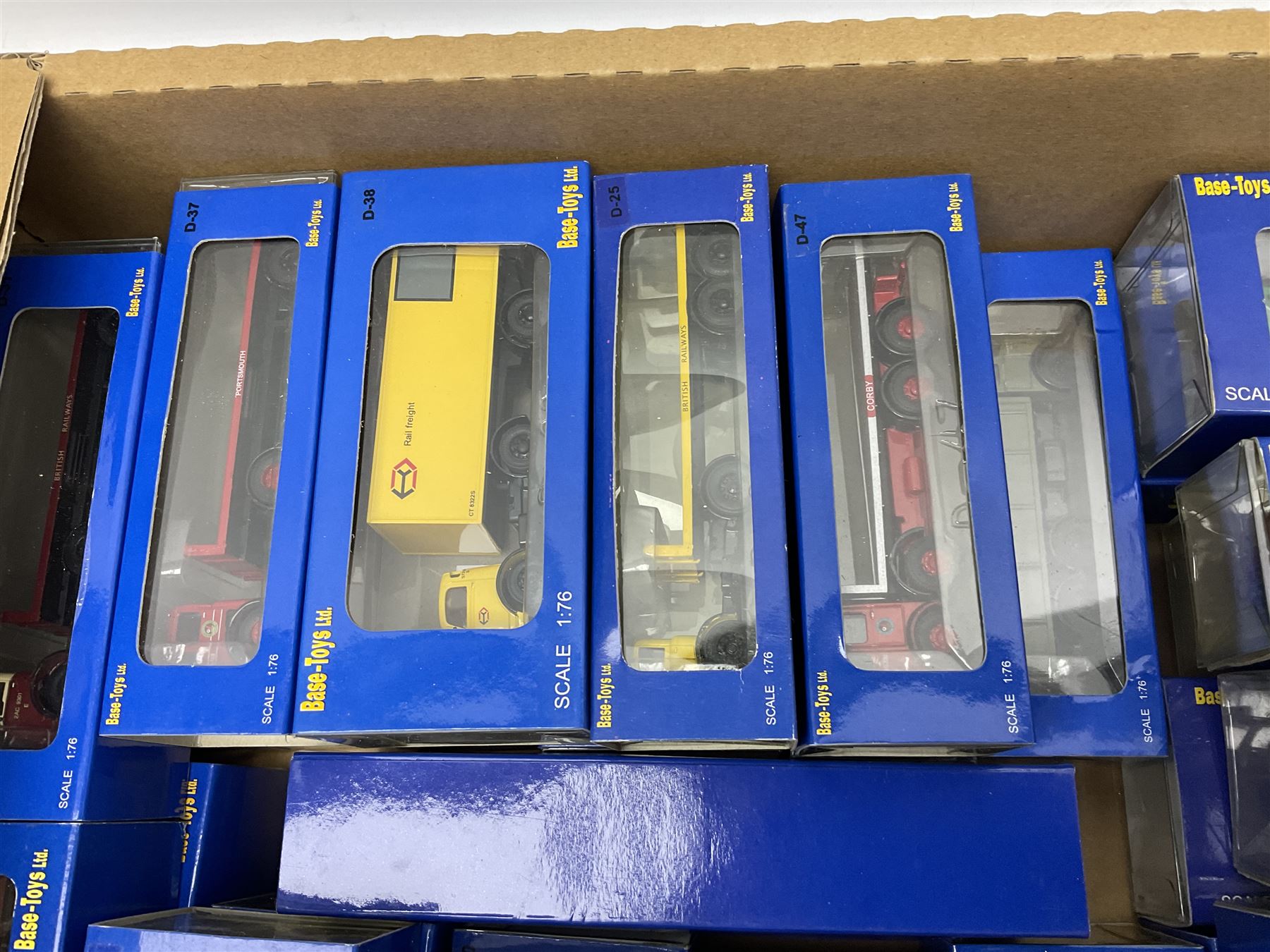 Fifty-seven Base Toys 1:76 scale die-cast models, all boxed (57)