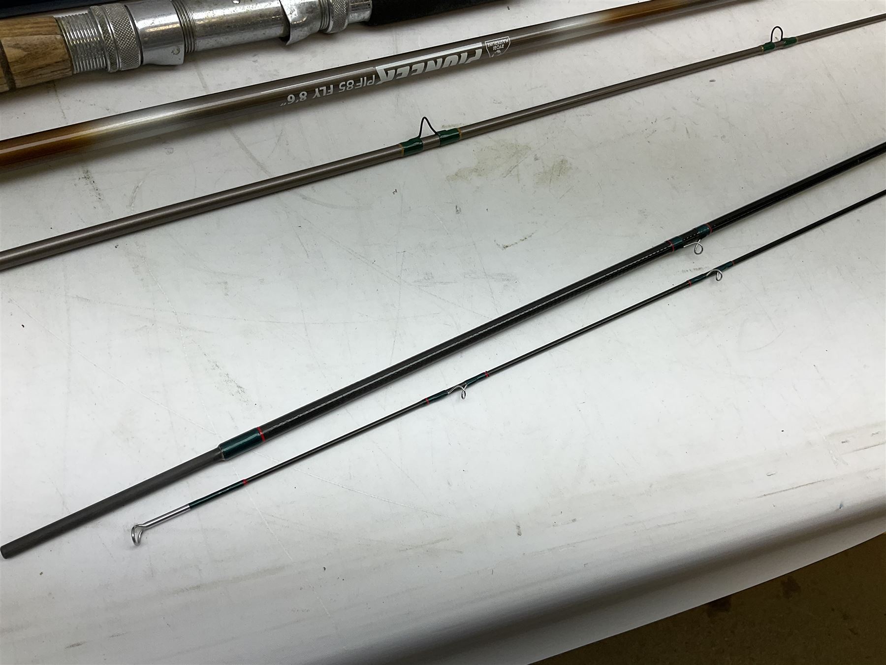 Shakespeare 'Composite Beachcaster 1332-300' 10ft two piece rod with Shakespeare alpha reel, Elastiglas two piece fly rod, Ryobi Masterline carbon fibre 'Pioneer PIF 85 Fly 8' 6
