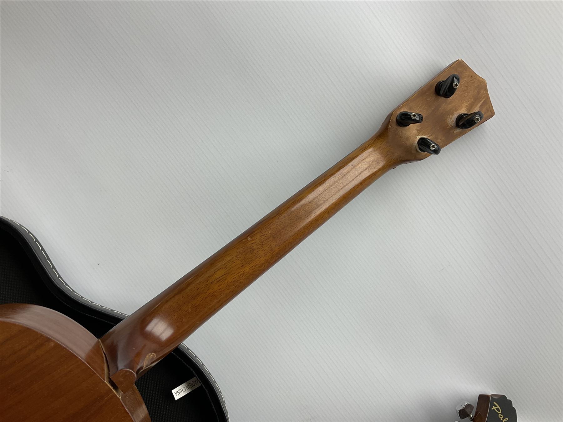 Palmer eight-string mandolin with mahogany back, simulated ivory and mother-of-pearl mounts L67cm; and Mahalo mahogany cased baritone scale ukulele, model no.U320B, L76cm; in hard carrying case (2)