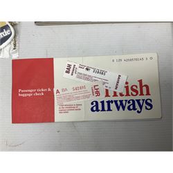 British Airways Concorde - inflight complimentary amenity pack including footwear, menu, stationery, three photographic slides, luggage label, cocktail stirrers, eye shades, fact sheet etc; in original branded blue vinyl bag with used 18th September 1977 ticket from Bahrain to London; together with a Singapore Airlines amenity kit bag with contents