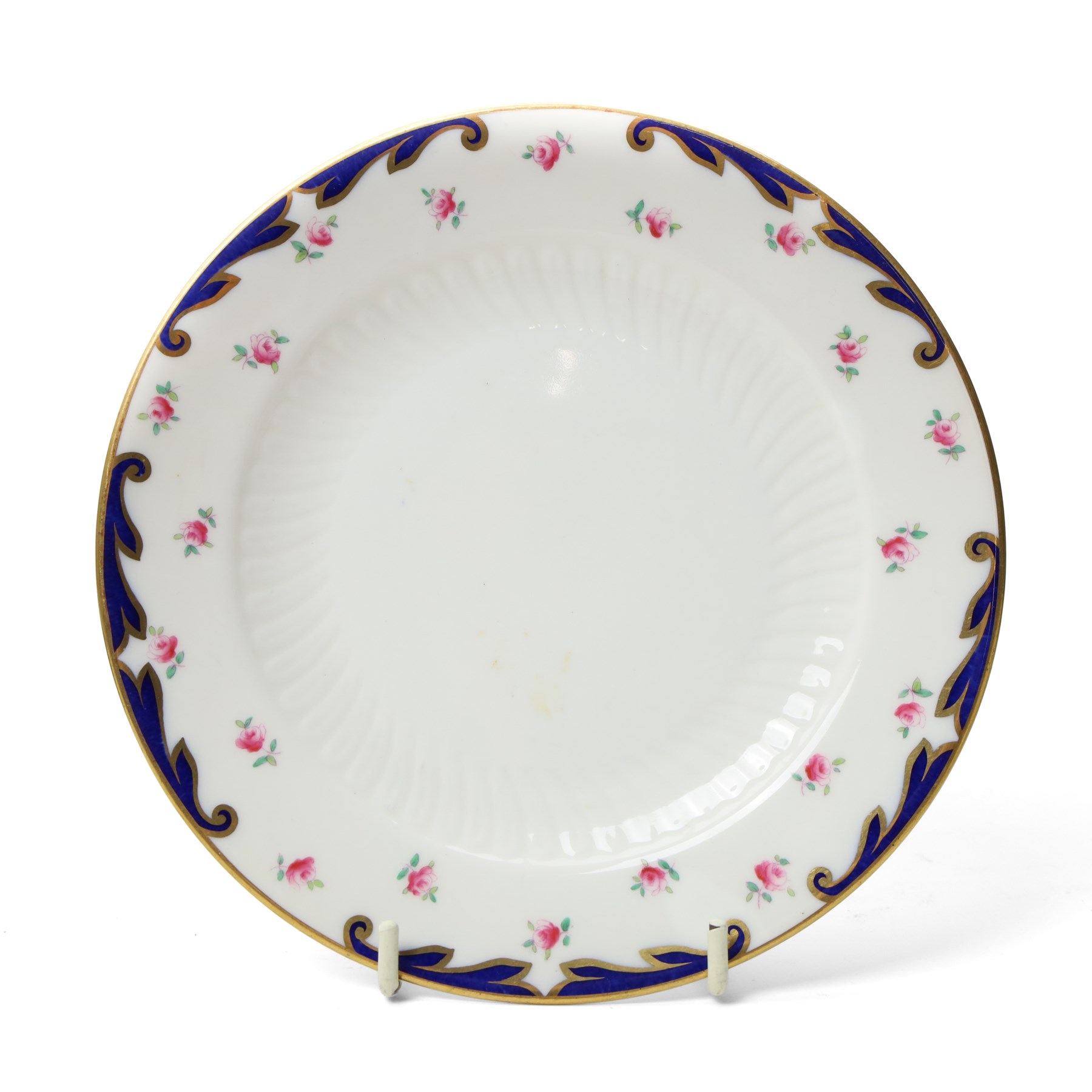 Wedgwood tea service decorated with floral sprays within a blue and gilt border comprising five cups, ten saucers, seven plates, two bread and butter plates, milk jug and sugar bowl