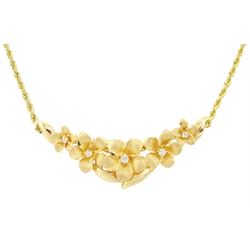 14ct gold diamond flower head necklace, five graduating flowers, each set with a single ro...